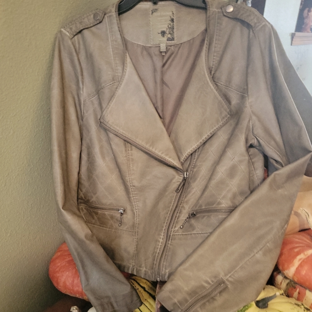 Rustic Style Bomber or flight jacket appeal. Great condition. Mad to look worn.
